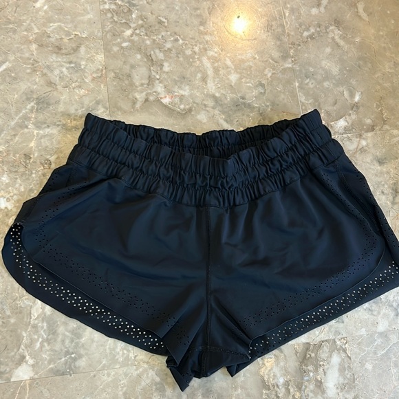lululemon athletica Pants - Lululemon black unlined shorts with decorative holes. Rare find! Super cute!